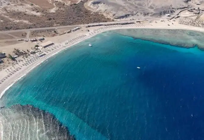 Aerial view of Sharm El Naga beach, showcasing pristine waters and sandy shores, ideal for the Sharm El Naga snorkeling tour experience.