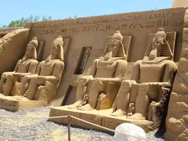 Sand City Museum's open-air display of intricately carved Egyptian-themed sand statues, showcasing mythological figures and legendary characters in a unique cultural experience.