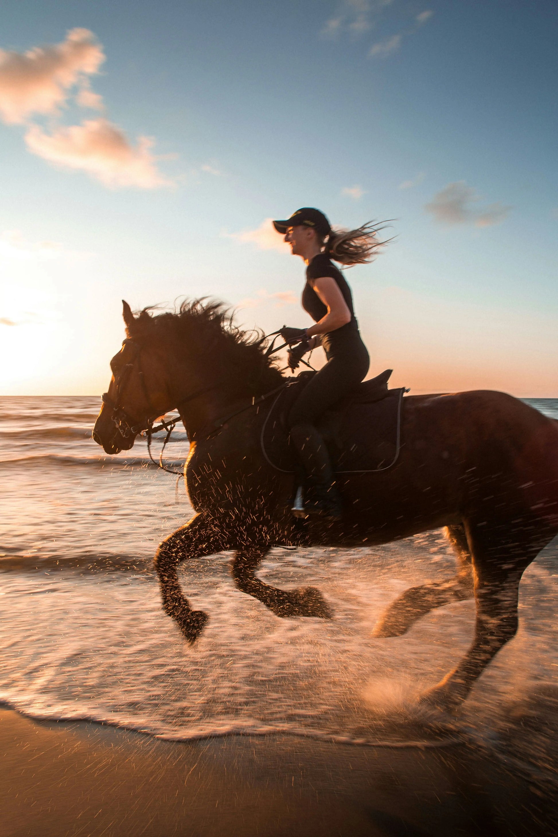 Woman riding a horse on a beach, illustrating the horse-riding (3 hours) experience, highlighting serene equestrian adventure along stunning coastal landscapes.