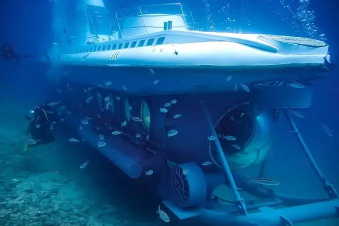 A small submarine with large viewing windows under water
