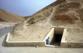 Luxor day tour package showcasing a person exploring a cave, highlighting the adventure and cultural experience of visiting Egypt's historical sites.