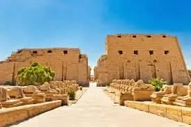 Day trip to Luxor: Stone ruins and statues, reflecting ancient Egyptian history and architecture, highlighting the archaeological significance of Karnak Temple and surrounding sites.