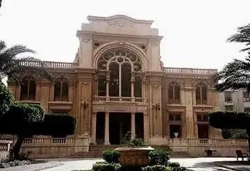Cultural tour to Cairo - 1 day: View of a grand building with classical architecture, a fountain, and arched windows, capturing the cultural essence of Cairo.