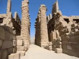 Day trip to Luxor: Image depicts ancient stone structures with columns, reminiscent of Karnak Temple, emphasizing the historical essence of the Luxor tour experience.