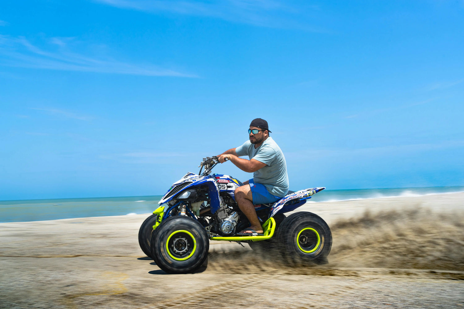 A quad bike in the desert from the side