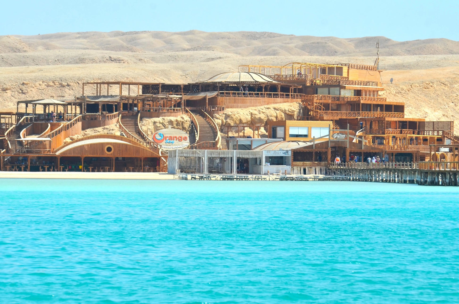 Orange Bay Tour: Scenic view of a waterside building in Hurghada, highlighting adventure and relaxation activities offered on this memorable excursion.
