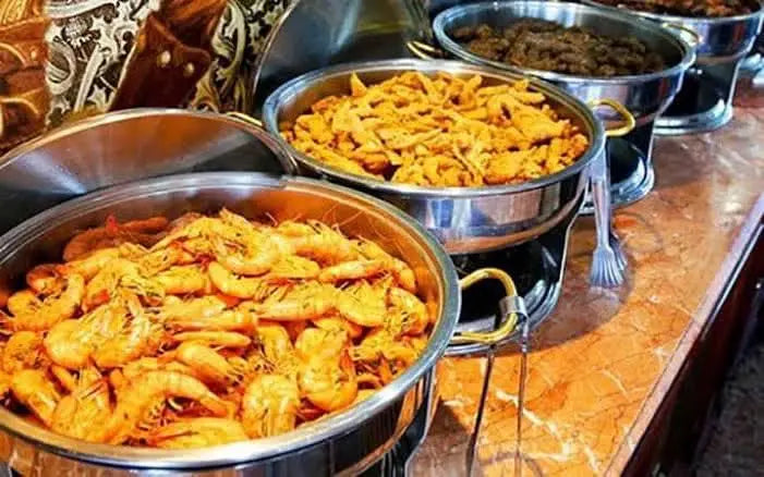 You can see an inviting buffet laid out with delicious dishes. 