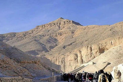 Group of hikers in a sunlit valley, echoing the adventure of the Tagestrip nach Luxor, a day trip exploring Egypt's historical landmarks.